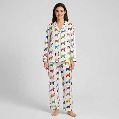Women's satin pajama set with French bulldogs in striped, polka dot and plaid sweaters on white - long sleeve and pants