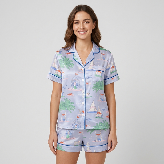 Women's satin pajama set with palm trees, sailboats and a puppy on the waves on periwinkle - short sleeve and shorts