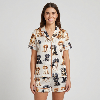 Women's long-sleeve satin pajama set with Cavalier King Charles spaniels in ruby, tricolor and black-and-tan on white - short sleeve and shorts