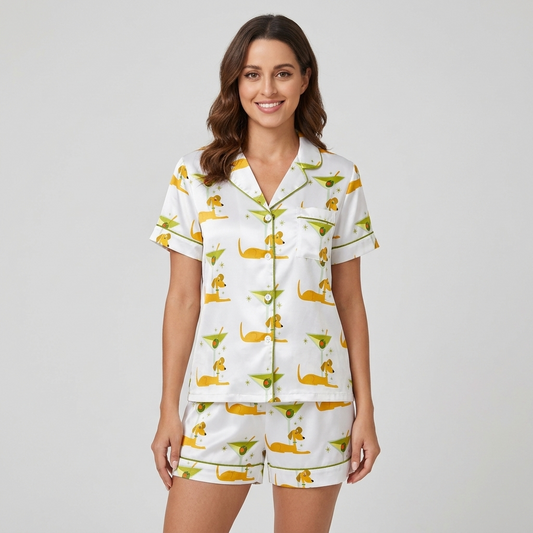 Women's satin pajama set with golden dachshunds beside green martini glasses and olives on white - short sleeve and shorts