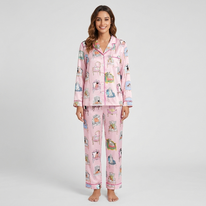 Women's satin pajama set with dogs on watercolor antique armchairs on pale pink with hot pink piping - long sleeve and pants