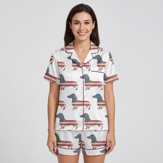 Women's satin pajama set with dachshund silhouettes filled with a weathered American flag on white - short sleeve and shorts