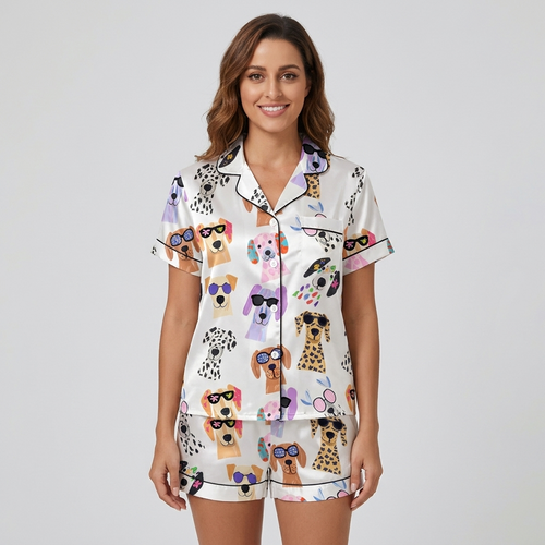 Women's satin pajama set with Labradors and dalmatians in bold sunglasses with confetti and party horns on white - short sleeve and shorts