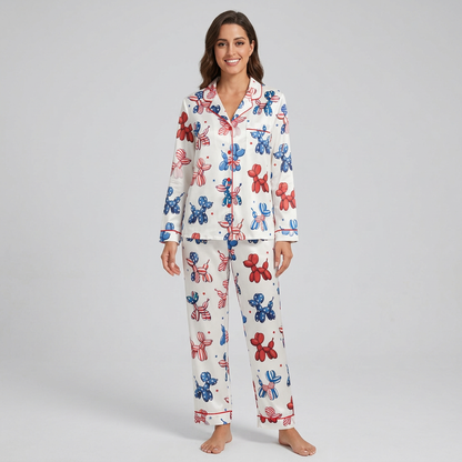 Women's satin pajama set with red, white and blue balloon dogs and confetti stars on white - long sleeve and pants