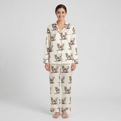 Women's satin pajama set with sketched golden retrievers skiing on pink skis on snowy white - long sleeve and pants