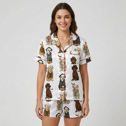 Women's satin pajama set with dogs in Halloween masks, hoods and hats beside jack-o'-lanterns on white - short sleeve and shorts