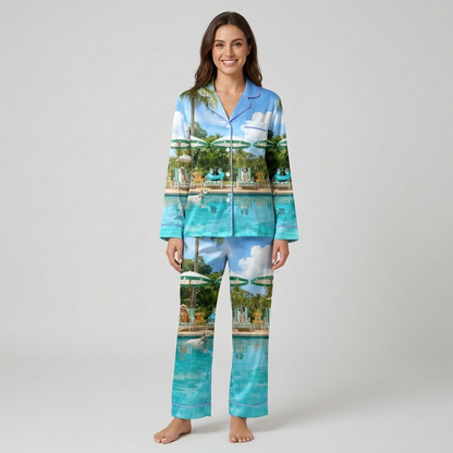 Women's satin pajama set with dogs on loungers under umbrellas by a turquoise pool with palm trees on light blue - long sleeve and pants