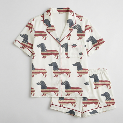 Women's satin pajama set with oversized dachshund silhouettes filled with a distressed American flag on white - flat lay