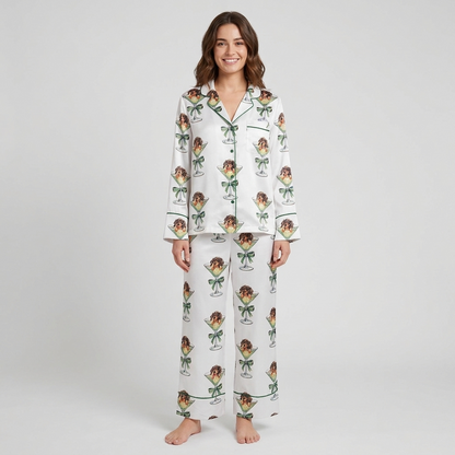 Women's satin pajama set with dachshund puppies peeking over martini glasses tied with sage green bows - long sleeve and pants