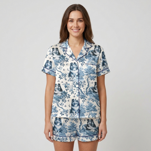 Women's satin pajama set with Shetland sheepdogs among blue-and-white toile trees and butterflies - short sleeve and shorts