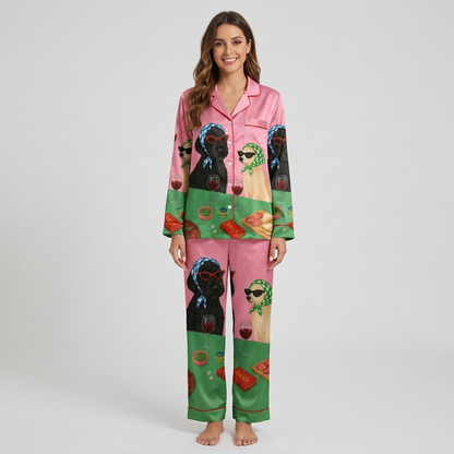 Women's satin pajama set with a black dog in cat-eye sunglasses and a golden dog in a scarf with wine on pink - long sleeve and pants
