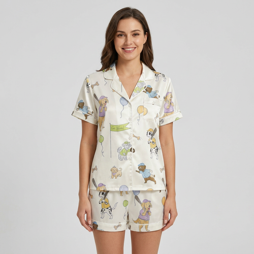Women's satin pajama set with dogs in caps and jerseys swinging bats on cream - short sleeve and shorts