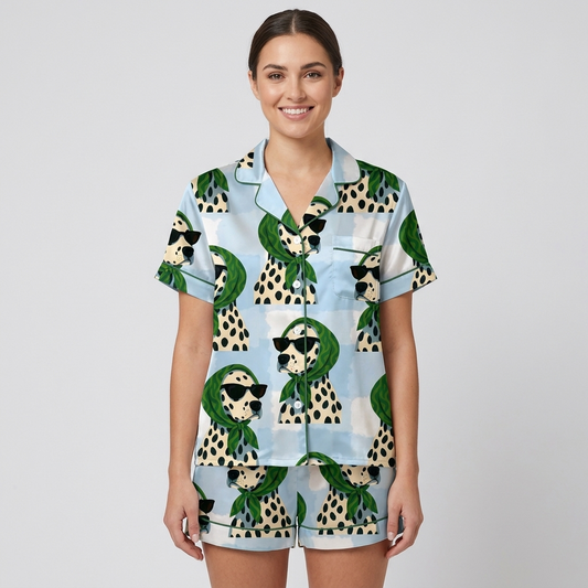 Women's satin pajama set with Dalmatians in green headscarves and black sunglasses on sky blue with clouds - short sleeve and shorts