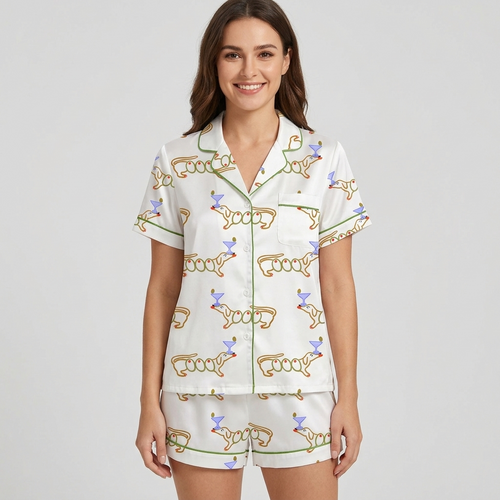 Women's satin pajama set with orange-outlined dachshunds beside lavender martini glasses on white - short sleeve and shorts