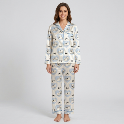 Women's satin pajama set with sleepy white fluffy dogs in sky-blue hearts on white - long sleeve and pants