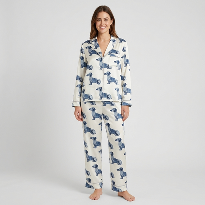 Women's satin pajama set with navy patchwork-style dachshunds in rows on white - long sleeve and pants