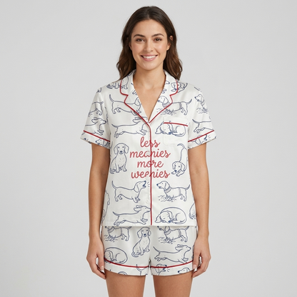 Women's satin pajama set with navy line-drawn dachshunds with red script on white - short sleeve and shorts