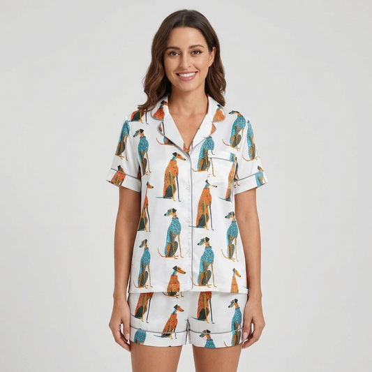 Women's long-sleeve satin pajama set with greyhounds in teal and rust patterned coats in rows on white - short sleeve and shorts