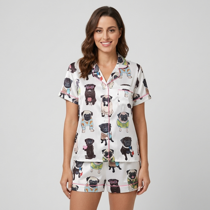 Women's satin pajama set with fawn and black pugs in sweaters, sunglasses and ties on white with pink piping - short sleeve and shorts