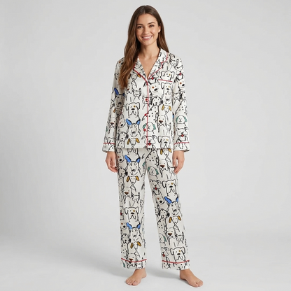 Women's satin pajama set with black line-drawn dogs and dalmatians with blue and mustard ears on white - long sleeve and pants