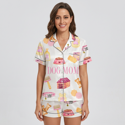 Women's satin pajama set printed DOG MOM with bones, treats, bowls and a pink doghouse on white - short sleeve and shorts