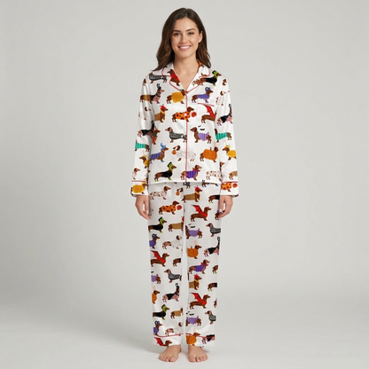 Women's satin pajama set with dachshunds in pumpkin suits and witch hats with candy and bats on white - long sleeve and pants