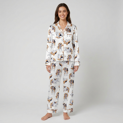 Women's satin pajama set with tricolor beagles in black ribbon collars rolling over on white with copper piping - long sleeve and pants