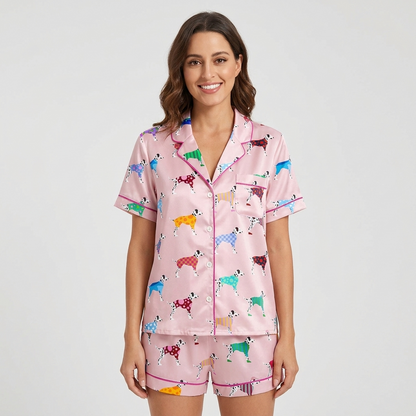 Women's satin pajama set with Dalmatians in rainbow polka dot and striped sweaters on blush pink with hot pink piping - short sleeve and shorts