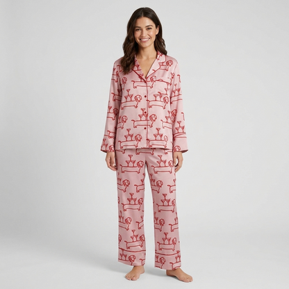 Women's long-sleeve satin pajama set with dachshunds and cocktail glasses in red line art on blush pink - long sleeve and pants