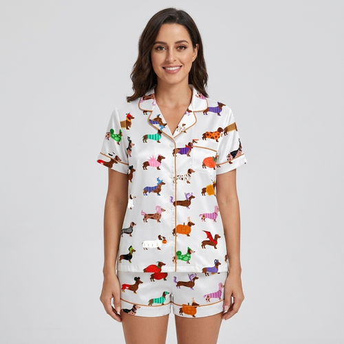 Women's satin pajama set with dachshunds in orange, teal, purple and red coats and costumes on white - short sleeve and shorts