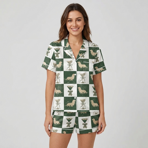 Women's satin pajama set with tan dachshunds and ribbon-wrapped cocktail glasses on a forest green and white checkerboard - short sleeve and shorts