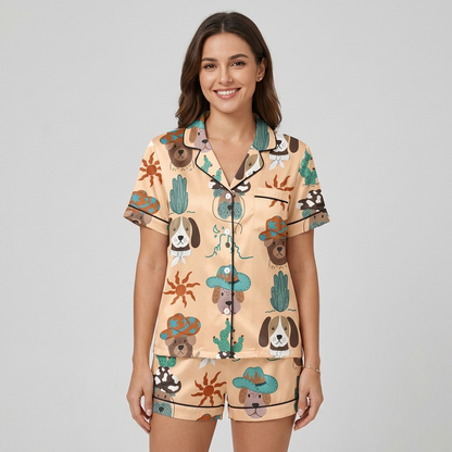 Women's satin pajama set in sand with floppy-eared pups in teal cowboy hats beside cacti and suns - short sleeve and shorts