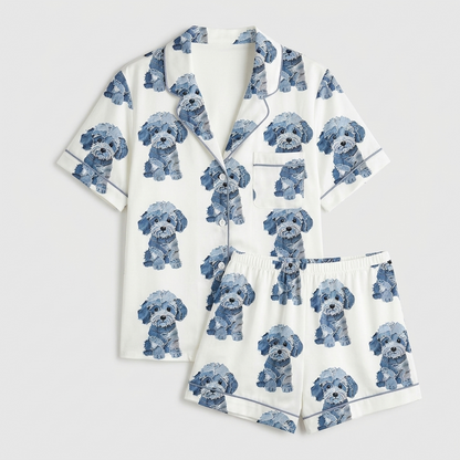 Women's satin pajama set with fluffy doodle pups in denim-textured blues in rows on white - flat lay