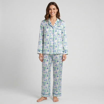 Women's satin pajama set with blue and white porcelain spaniel figurines in lattice frames on mint green - long sleeve and pants