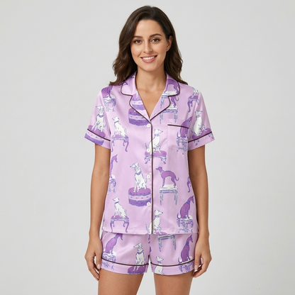 Women's satin pajama set with lilac and white greyhounds on antique stools on soft lavender with brown piping - short sleeve and shorts