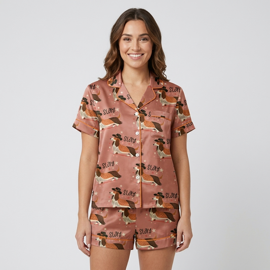 Women's satin pajama set with long-eared hound dogs in black cowboy hats with stars on salmon pink - short sleeve and shorts