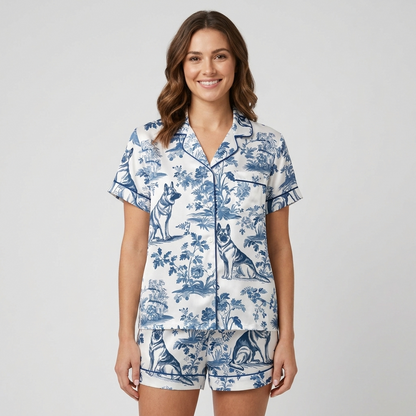 Women's satin pajama set with German Shepherds in a blue-and-white botanical toile scene on white - short sleeve and shorts