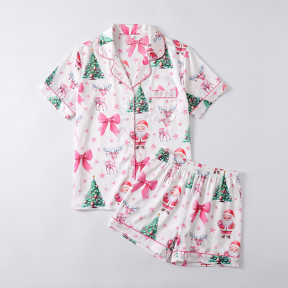 Pink Santas, Bows & Trees Women's Pajama Set - flat lay