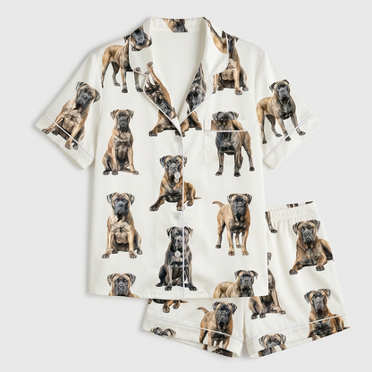 Women's satin pajama set with fawn, black and brindle Cane Corsos lounging on crisp white - flat lay