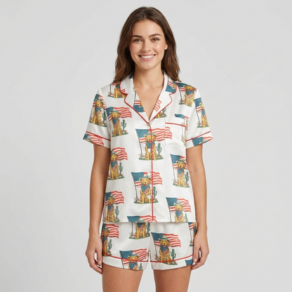 Women's satin pajama set with golden retrievers in cowboy hats and bandanas beside flags and cacti on white - short sleeve and shorts