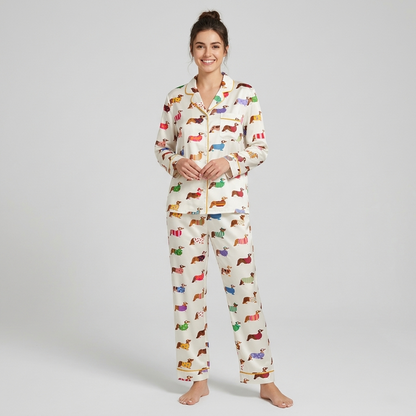 Women's satin pajama set with corgis in polka dot, striped and heart-print sweaters on white - long sleeve and pants
