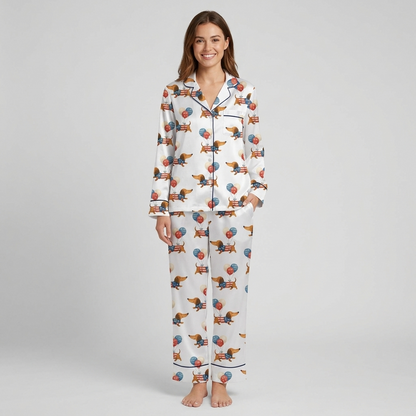 Women's satin pajama set with flag-print dachshunds among red, white and blue balloons on white - long sleeve and pants