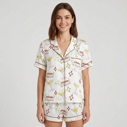 Women's satin pajama set with sketchy dachshunds, loaded hot dogs and olive martinis on white - short sleeve and shorts
