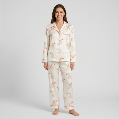 Women's satin pajama set with golden retriever puppies in bows holding tiny flags on soft cream - long sleeve and pants