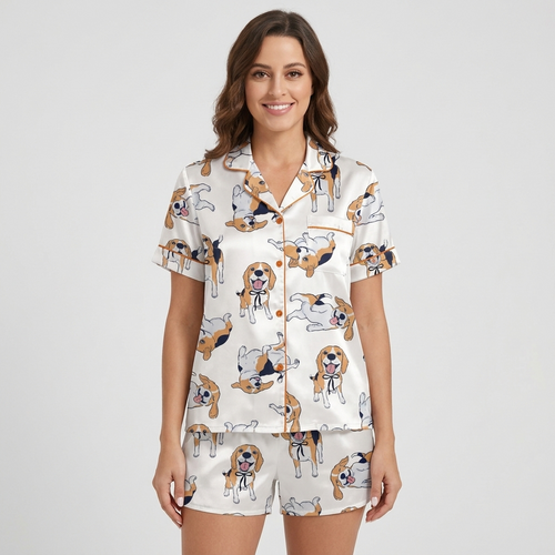 Women's satin pajama set with tricolor beagles in black ribbon collars rolling over on white with copper piping - short sleeve and shorts