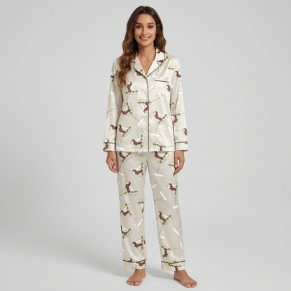 Women's satin pajama set with dachshunds stretched across martini glasses and olive picks on white with brown piping - long sleeve and pants