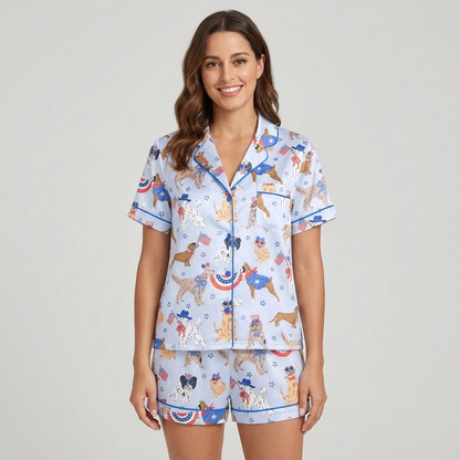 Women's satin pajama set with golden retrievers, a dalmatian and a bulldog in star hats on pale periwinkle - short sleeve and shorts