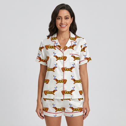Women's satin pajama set with russet dachshunds balancing blue cocktail glasses in rows on white - short sleeve and shorts