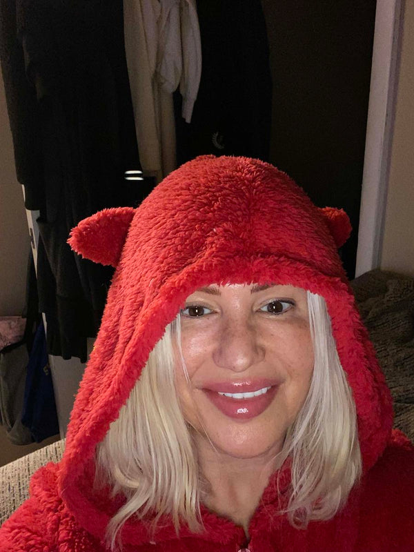 Bobbi R. wearing the fuzzy onesie