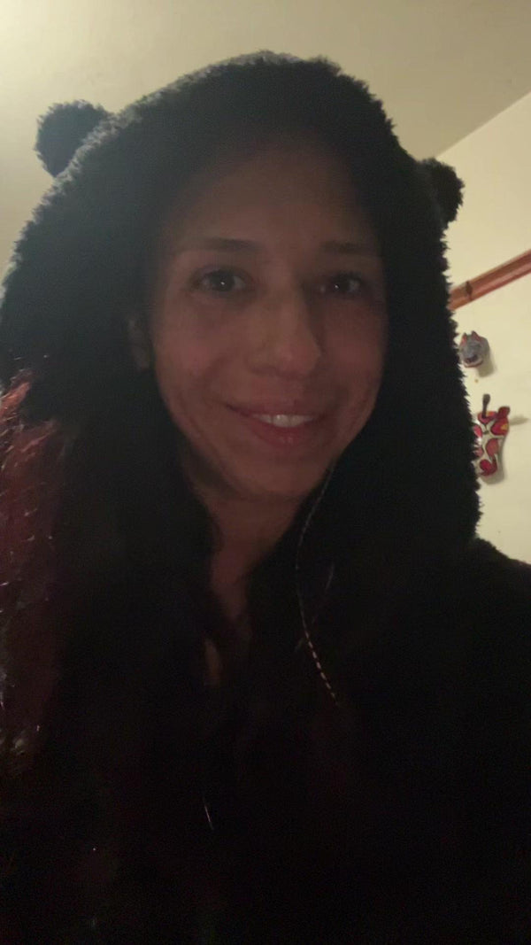 Yessica M. wearing the fuzzy onesie